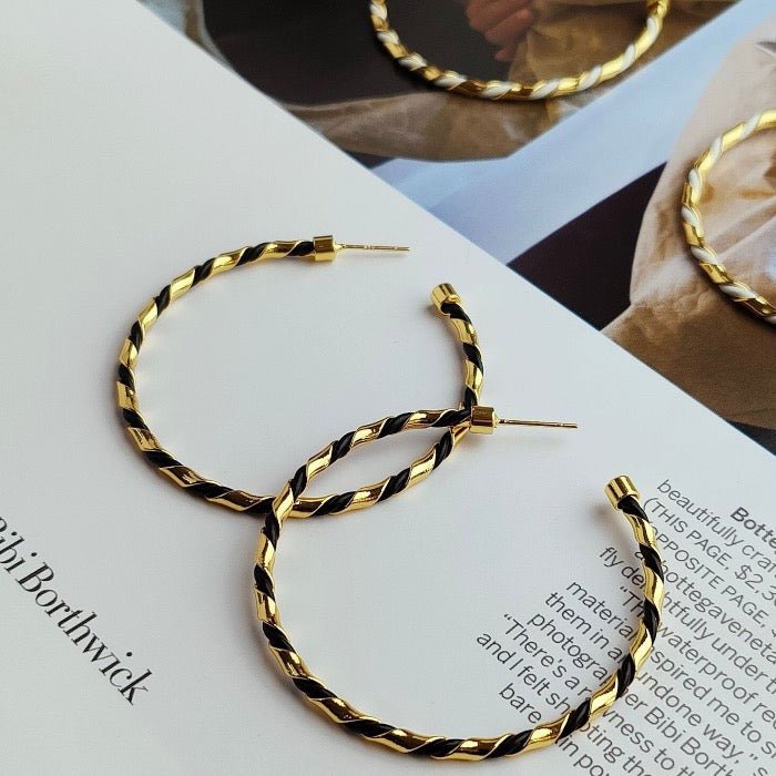 Chique minimalistische oorringen met gevlochten leer