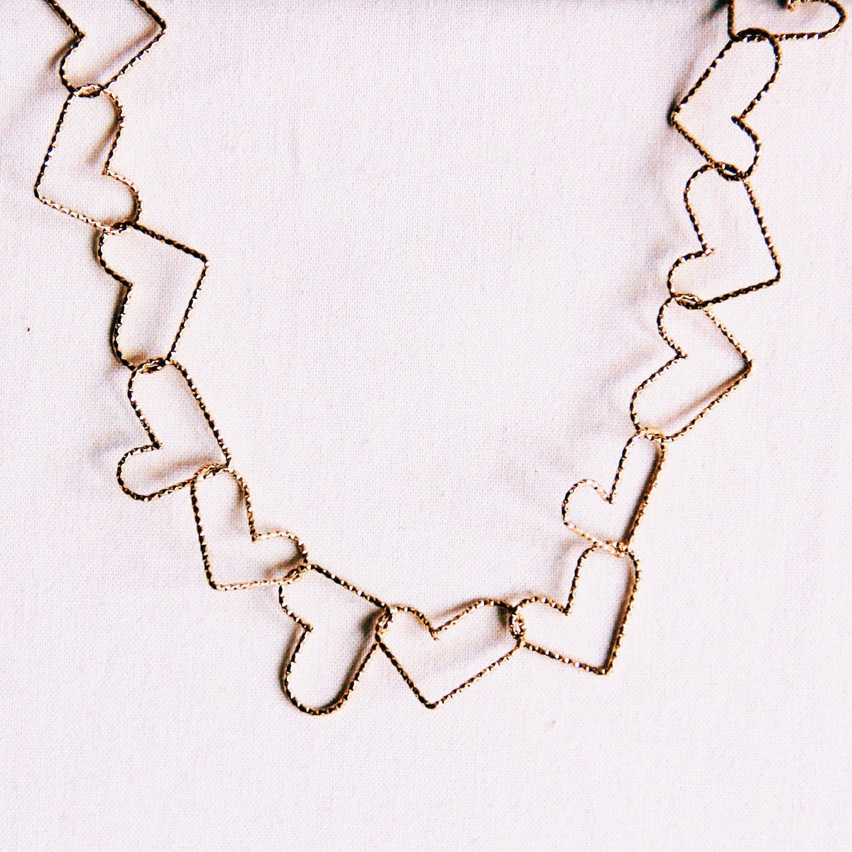 Gekoppelde hartenketen halsketting